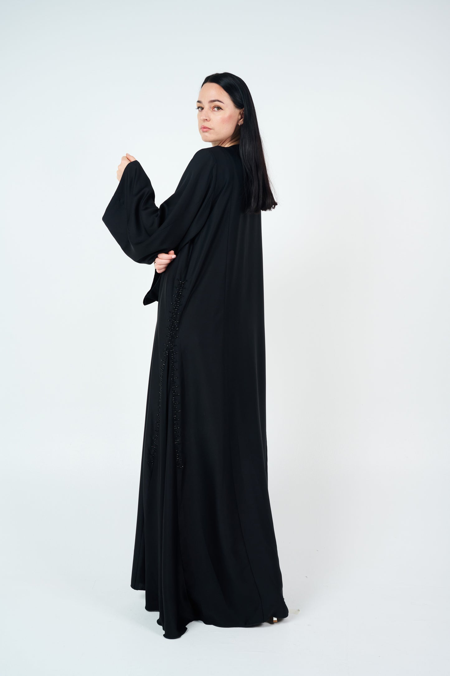 Embroidered Abaya with side Pleats.