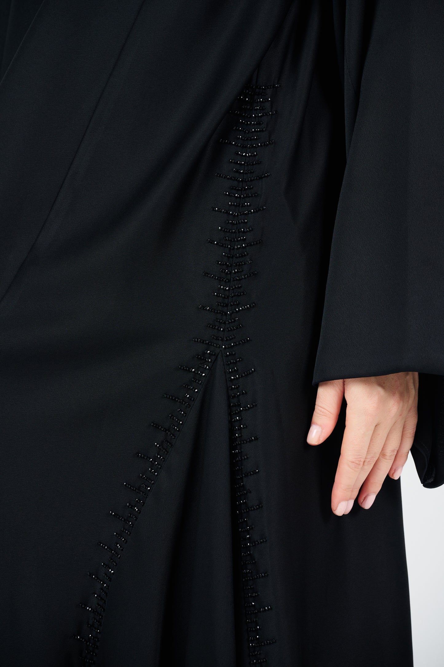 Embroidered Abaya with side Pleats.